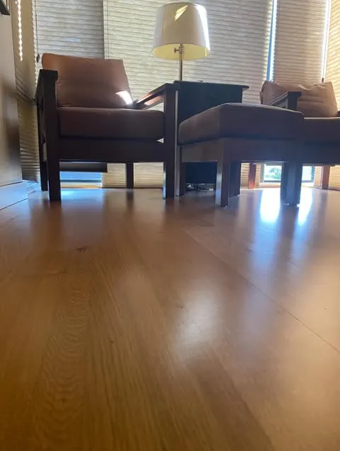 Clean living room with hardwood floors